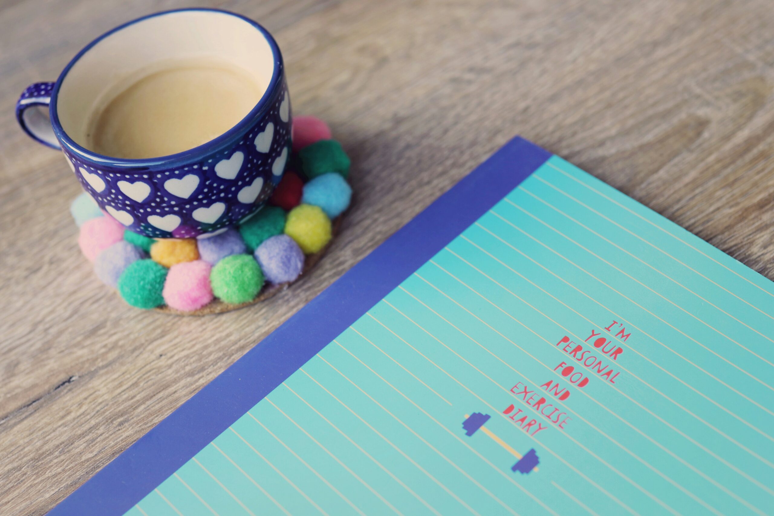 blue ceramic cup on tabletop